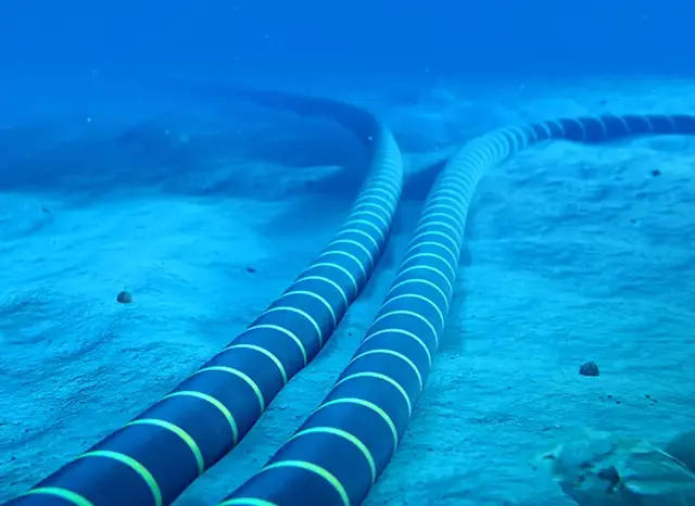 2 pipes underwater on the ocean floor