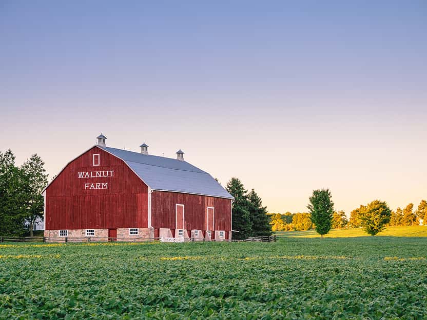 Image showing a red barn on expansive farmland in Indiana.