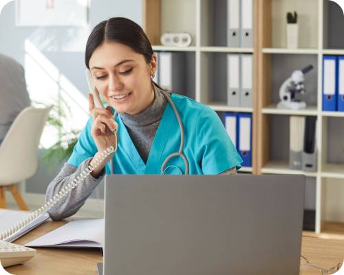 Utilization management nurse doing her job answering a phone call