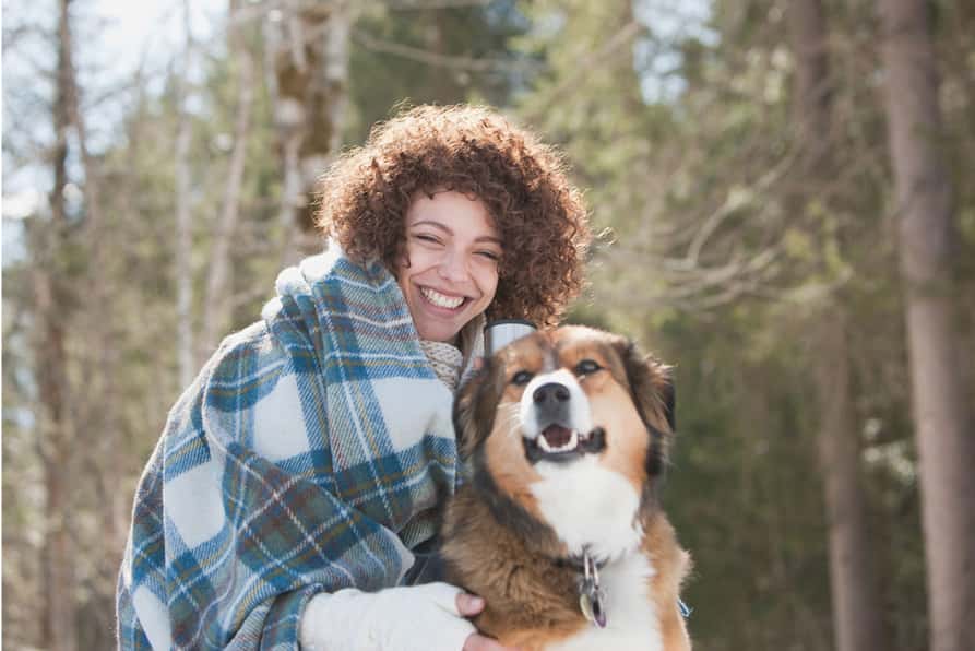 Trustaff Traveler posing with dog in the woods