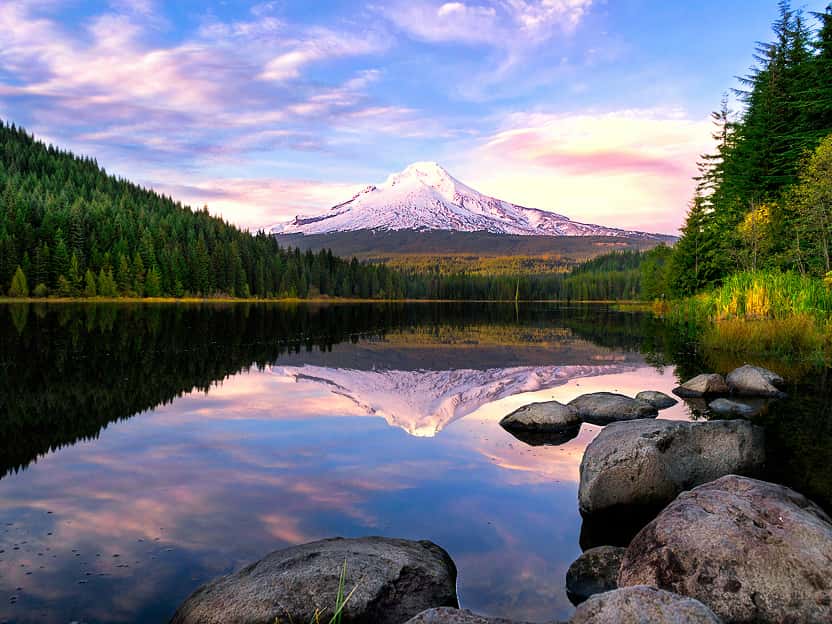 Image showing a lake surrounded by forested slopes and a snow peaked mountain in Oregon.