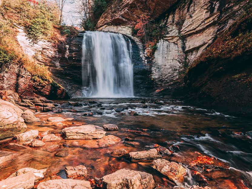 Image showing majestic waterfalls cascading down rocky cliffs in North Carolina.