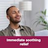 Image of a man smiling with the claim: Inmediate soothing relief