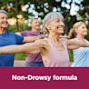 Image of a elder woman doing exercise with the claim: Non-Drowsy formula