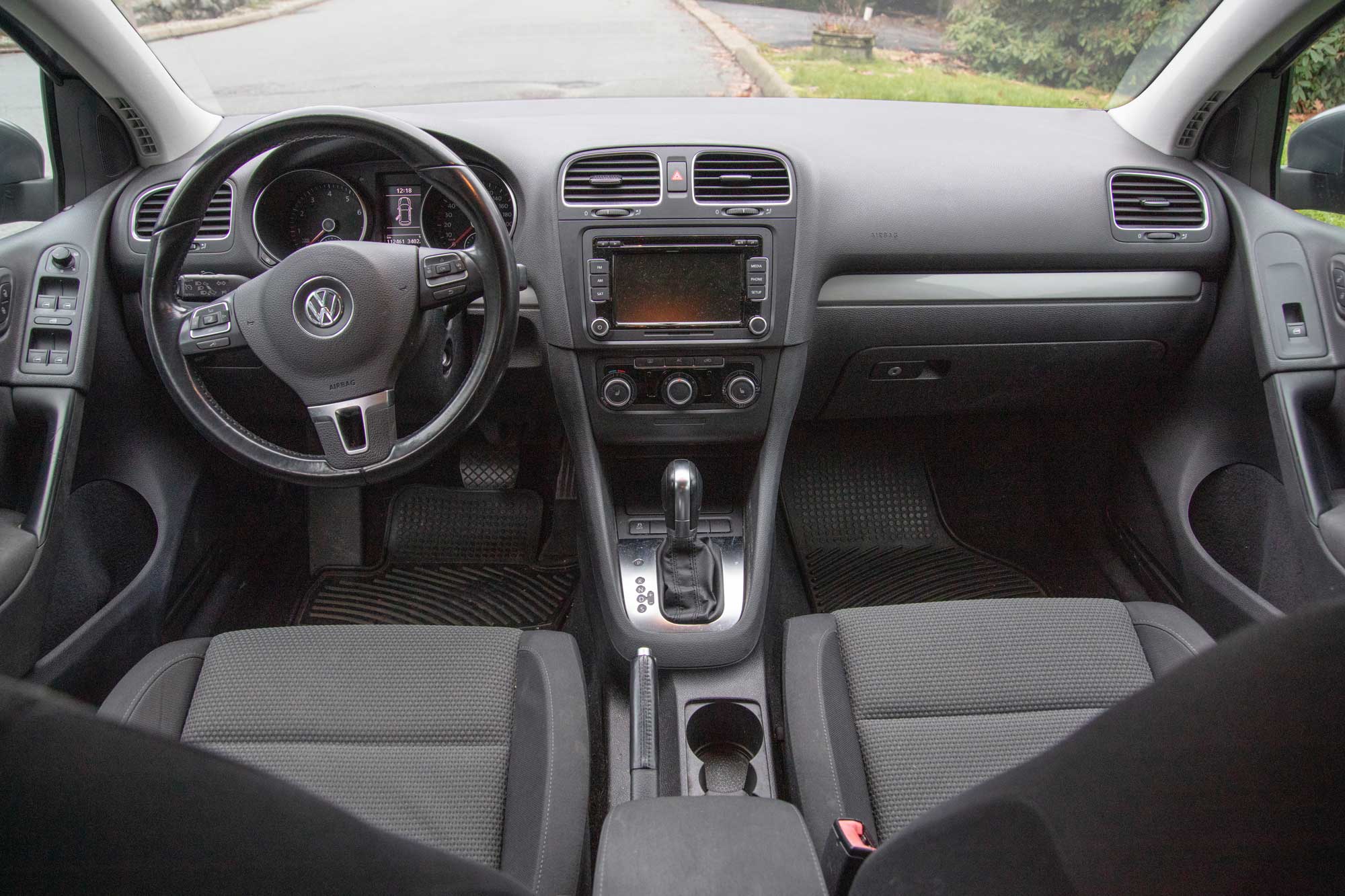 The overall view inside the vehicle, including the dash.