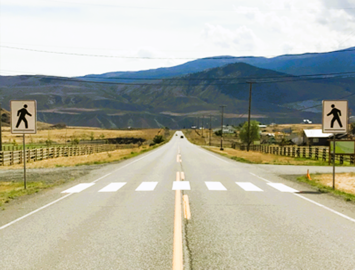 A new crosswalk with signage, installed on Nlaka’pamux and Secwepemc Nations territory near the town of Ashcroft, British Columbia.