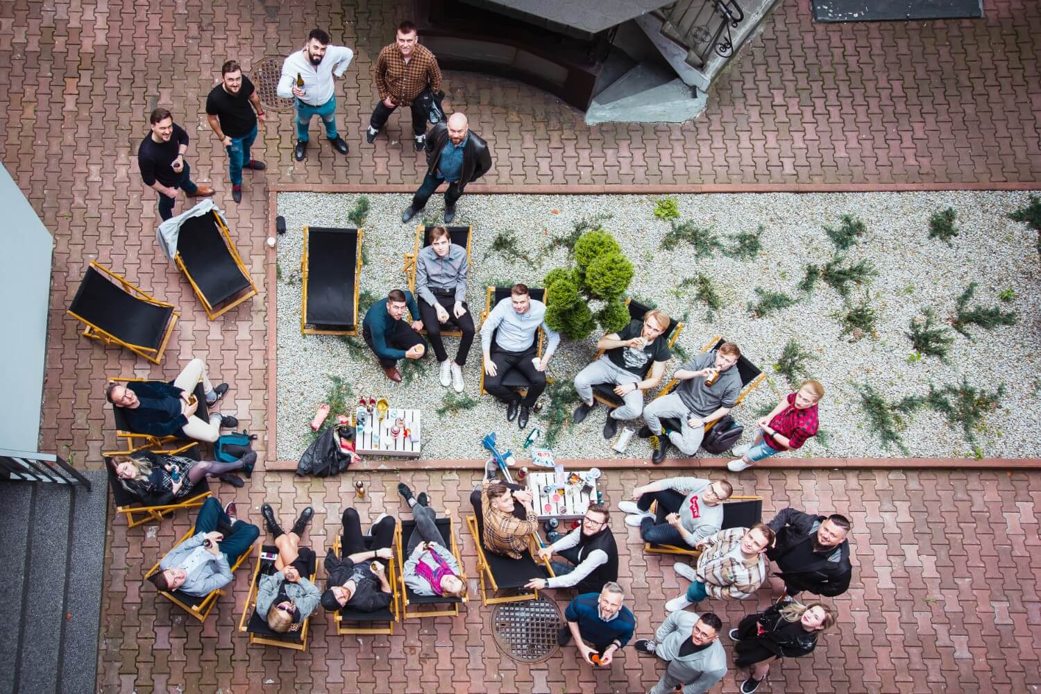 people sitting on deck chairs