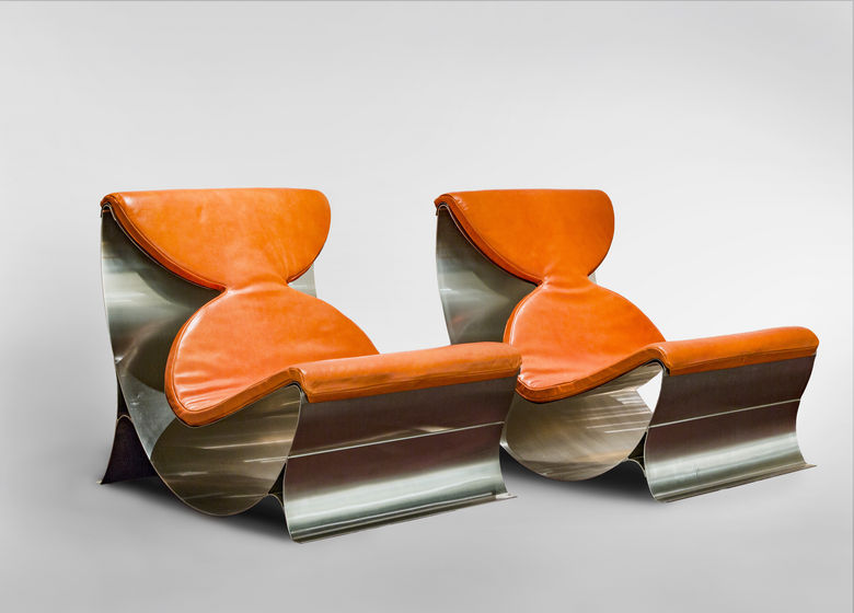 Maria pergay. pair of lounge chairs  1970. stainless steel  foam  leather cushions.