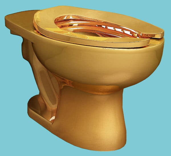 Maurizio cattelan  solid gold toilet to be inistalled at the guggenheim museum in may 2016