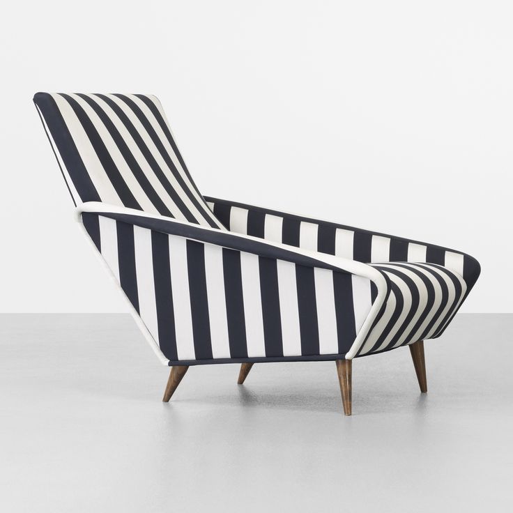 Lounge chair by gio ponti. silk  walnut  1953.