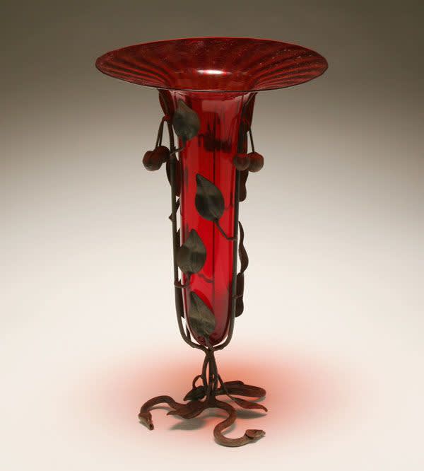 Umberto bellotto  red glass trumpet vase in floral wrought metal base  1920