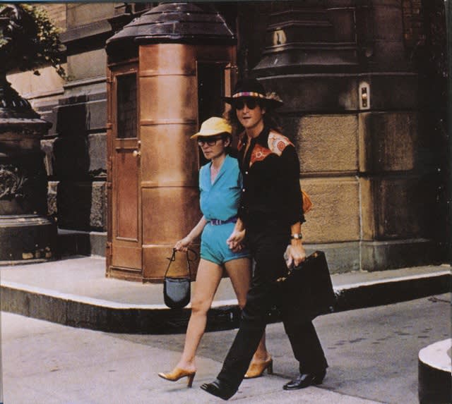  Yoko Ono and John Lennon , Walking Out of The Dakota, 1980 