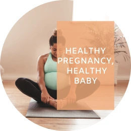 Caption reads: Healthy pregnancy, healthy baby. In the background, a pregnant woman smiles as she sits in a yoga pose.