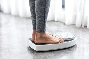 woman-on-weighing-scales