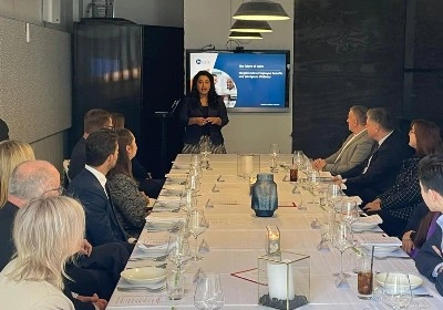 Dr Leena Johns speaks at an event with MetLife in Australia