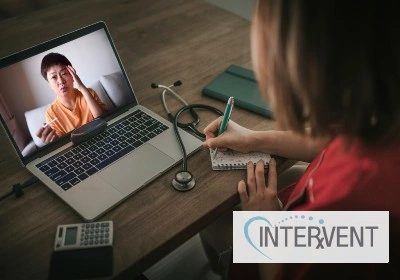 A doctor speaks to a patient in a virtual call via a laptop. INTERVENT's logo features in the corner.