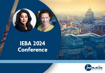 Dr Leena Johns and Maggie Lesterat IEBA conference 2024 - backdrop photo of Brussels