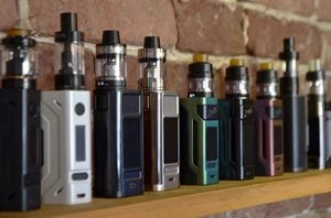 Vapes lined up against the wall