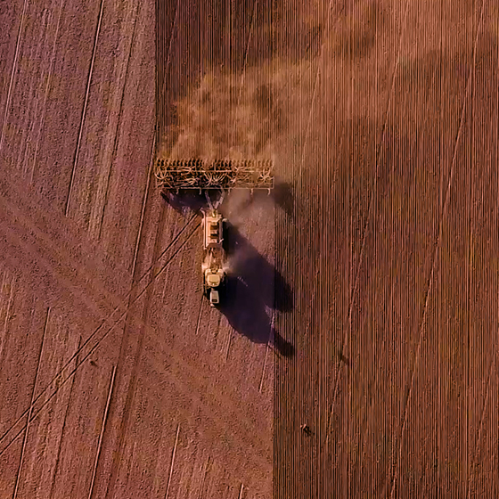 A farmer in Australia prepares their land with tillage.