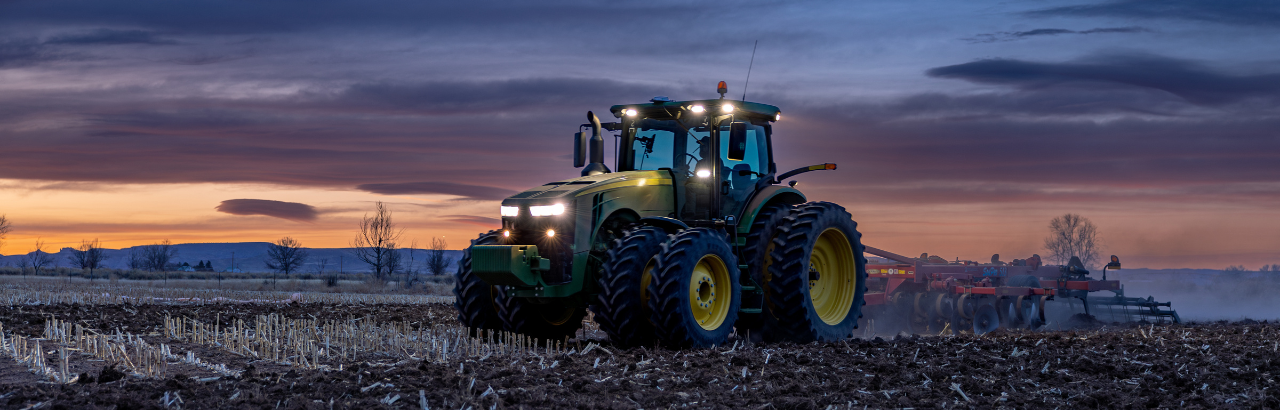 A tractor using the PTx Trimble NAV-960 guidance controller with Trimble IonoGuard technology.