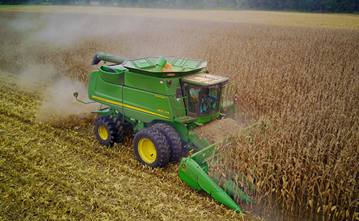 Farmers uses Trimble's RG-100 row guidance to add precision during corn harvest.