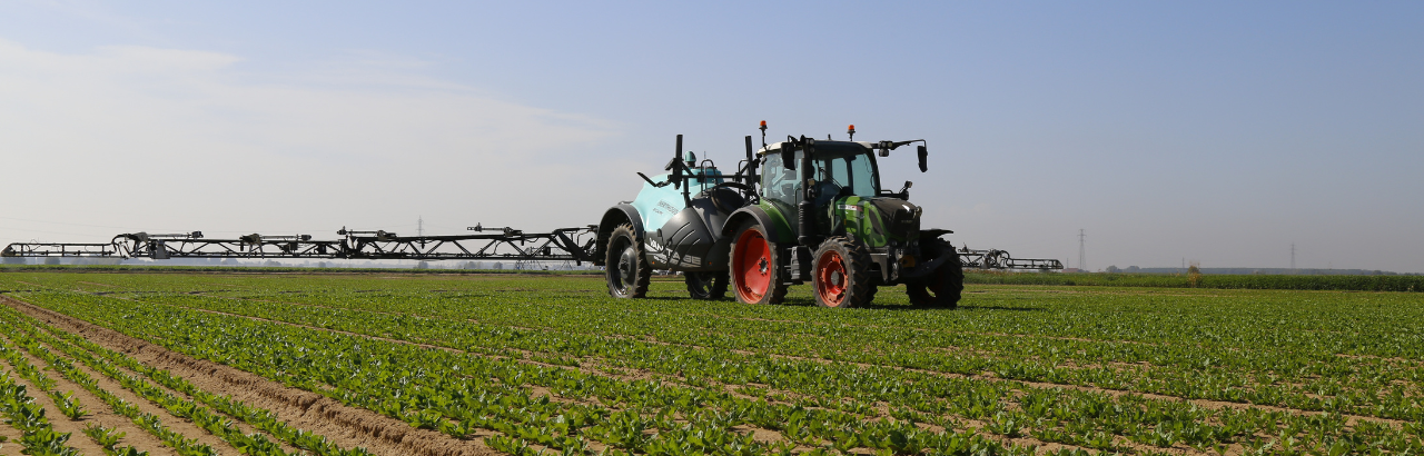 A farmer sprays a crop to protect against weeds, insects and other pests.