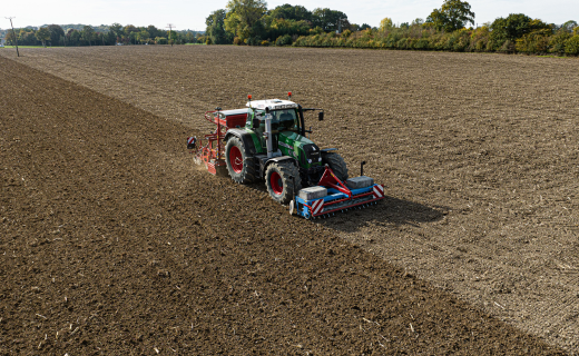 A NAV-860 guidance controller installed on a tractor in the field.