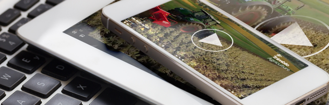 An image of Trimble Virtual Farm on a mobile phone.