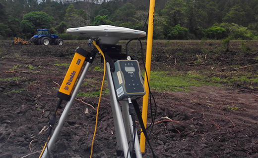 A farmer in Brazil uses the TDL 450L radio (external) to add precision to their farming operations.