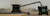 A combine harvests grain into a grain cart controlled with PTx Trimble OutRun autonomous technology.