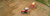 A red tractor planting in an open field
