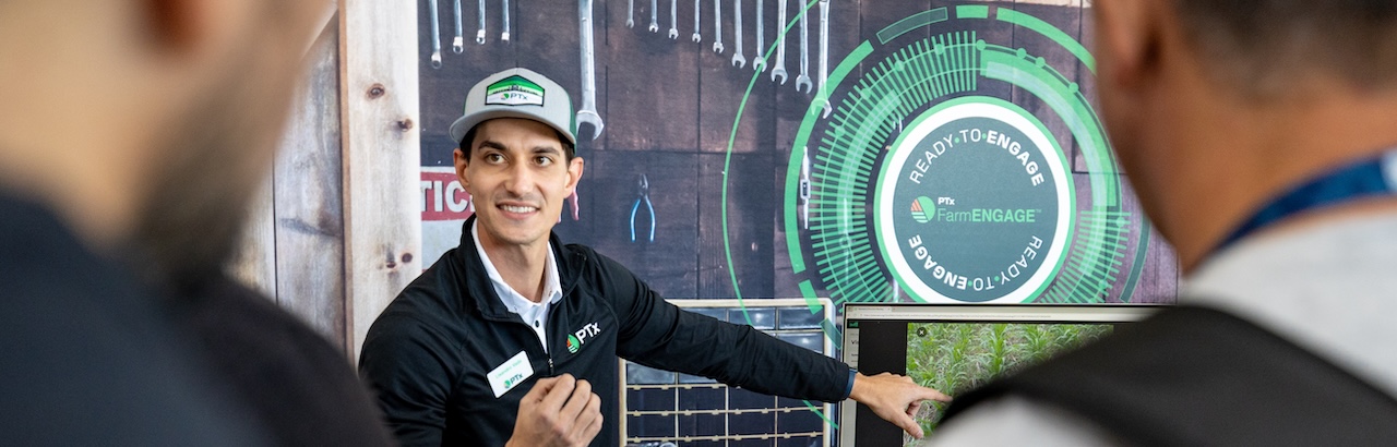 A PTx employee showcases the FarmENGAGE solution.