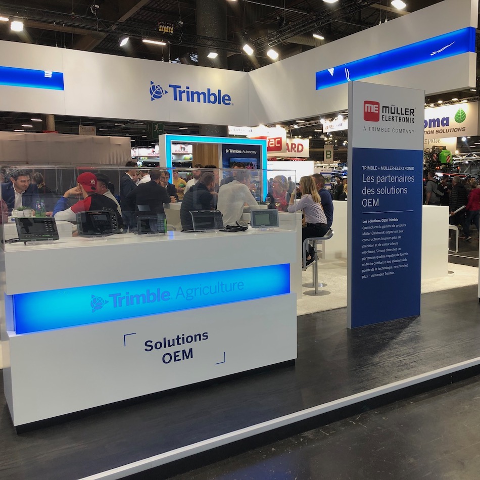 Trimble OEM solutions on display at a tradeshow.