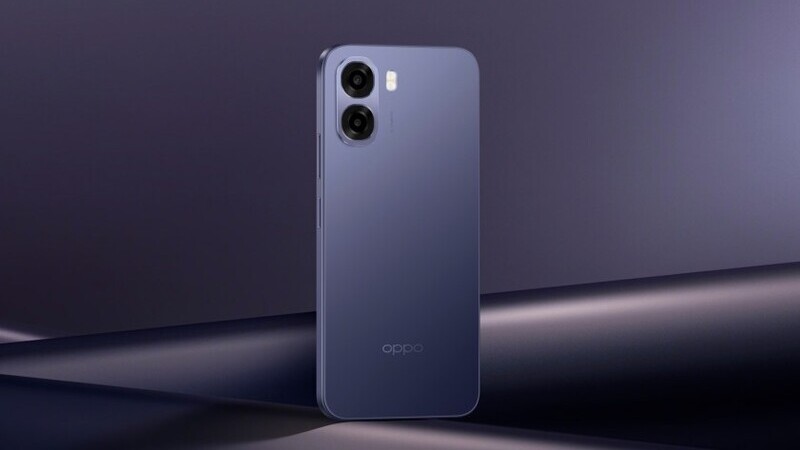 En lilafärgad mobil av modell OPPO A6x mot lila bakgrund. 