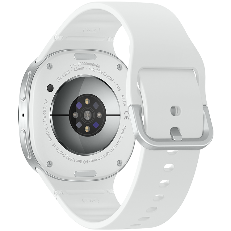 Galaxy Watch8 sedd från baksidan med pulssensor och sensorer synliga, med silverfärgat silikonarmband.