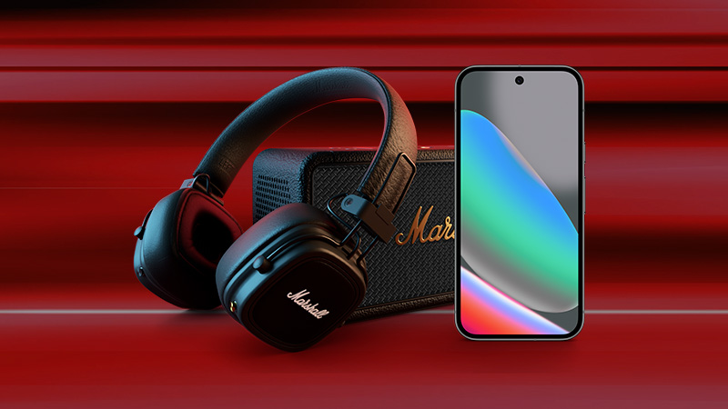 Google Pixel 10 med högtalare och hörlurar från Marshall mot en röd bakgrund