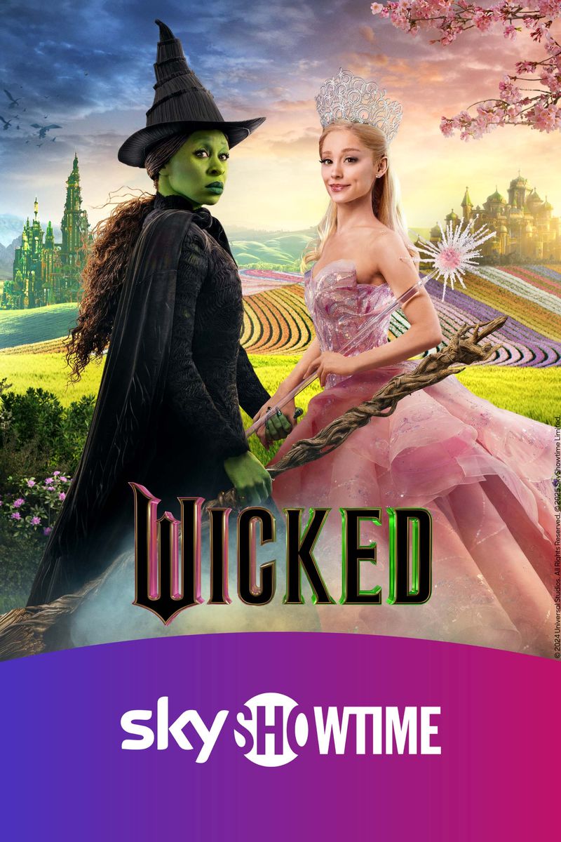 Filmaffisch för musikalen Wicked med häxan i svart och prinsessan i rosa mot ett färgglatt fantasilandskap.