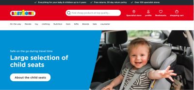 Image of BabyOne homepage showing a happy child in a child car seat.