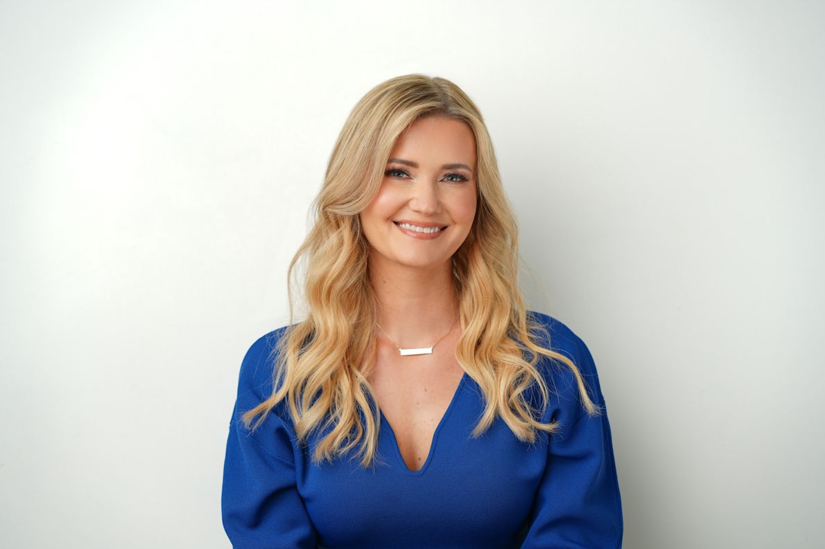 Tania Sottrel, SVP of Partnerships at Snapshot Design, smiling portrait against a neutral background.