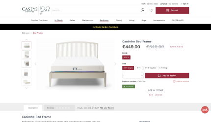 Product page for the Caoimhe bed frame at Caseys Furniture, showing a white bed frame with slatted headboard, price of €449, various size options and the option to add the product to your shopping cart.