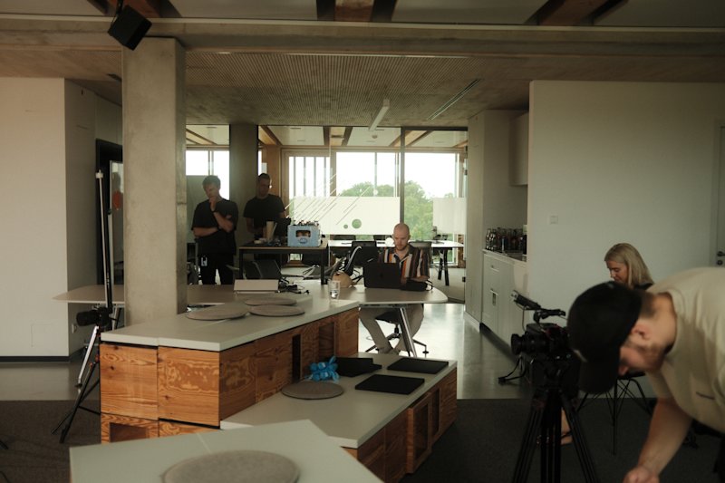 The Agentic Commerce Lab Team in an open space area. 