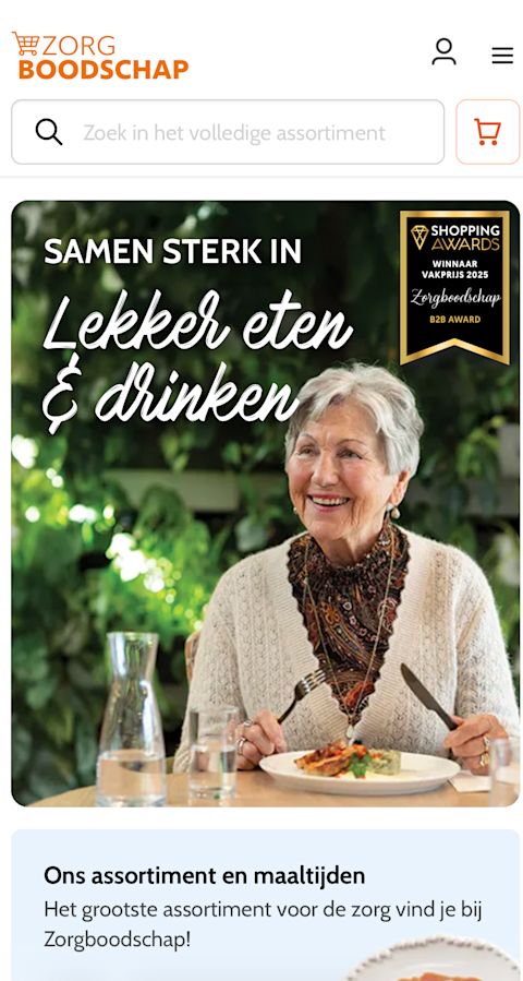 Mobile Startseite von Zorgboodschap mit dem Slogan „Samen sterk in lekker eten & drinken“, einem Shopping-Award-Badge und dem Bild einer lächelnden älteren Frau beim Essen an einem Tisch.