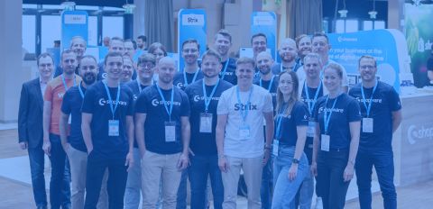 A group of people from Shopware and Shopware Partners posing for a team photo