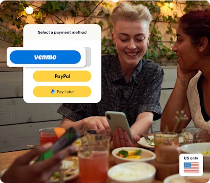 Two women at a restaurant table smiling at a phone. A screen overlay shows Venmo, PayPal, and Pay Later as payment method options.