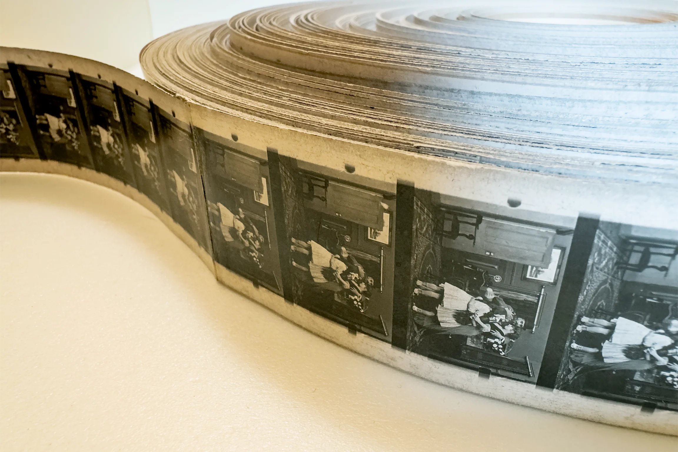 A close up of a black and white film reel