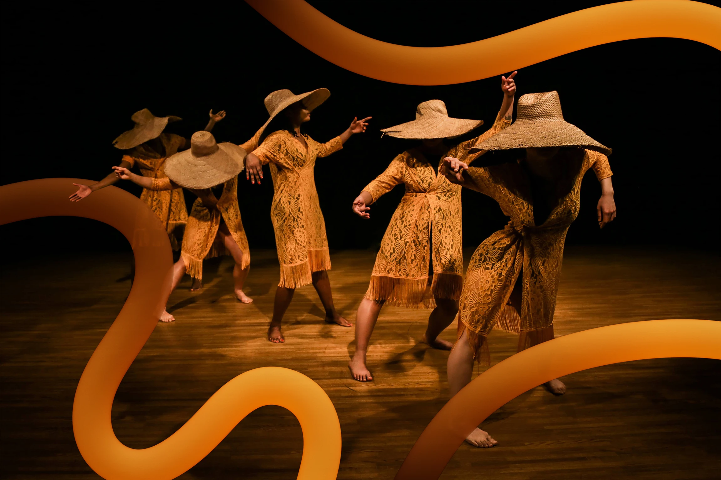Five dancers wearing large hats are in various movements