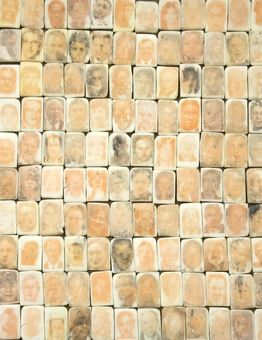 Jesse Krimes artwork, Purgatory, 2009, is a grid of images of faces from the newspaper that are transferred onto prison-issued bars of soap