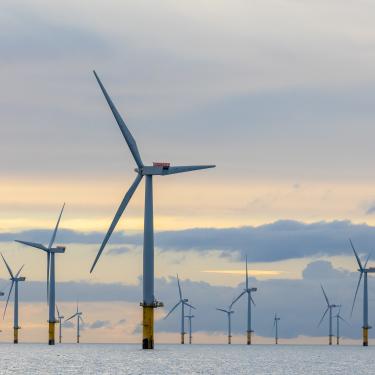 Offshore wind farm and ocean at sunrise