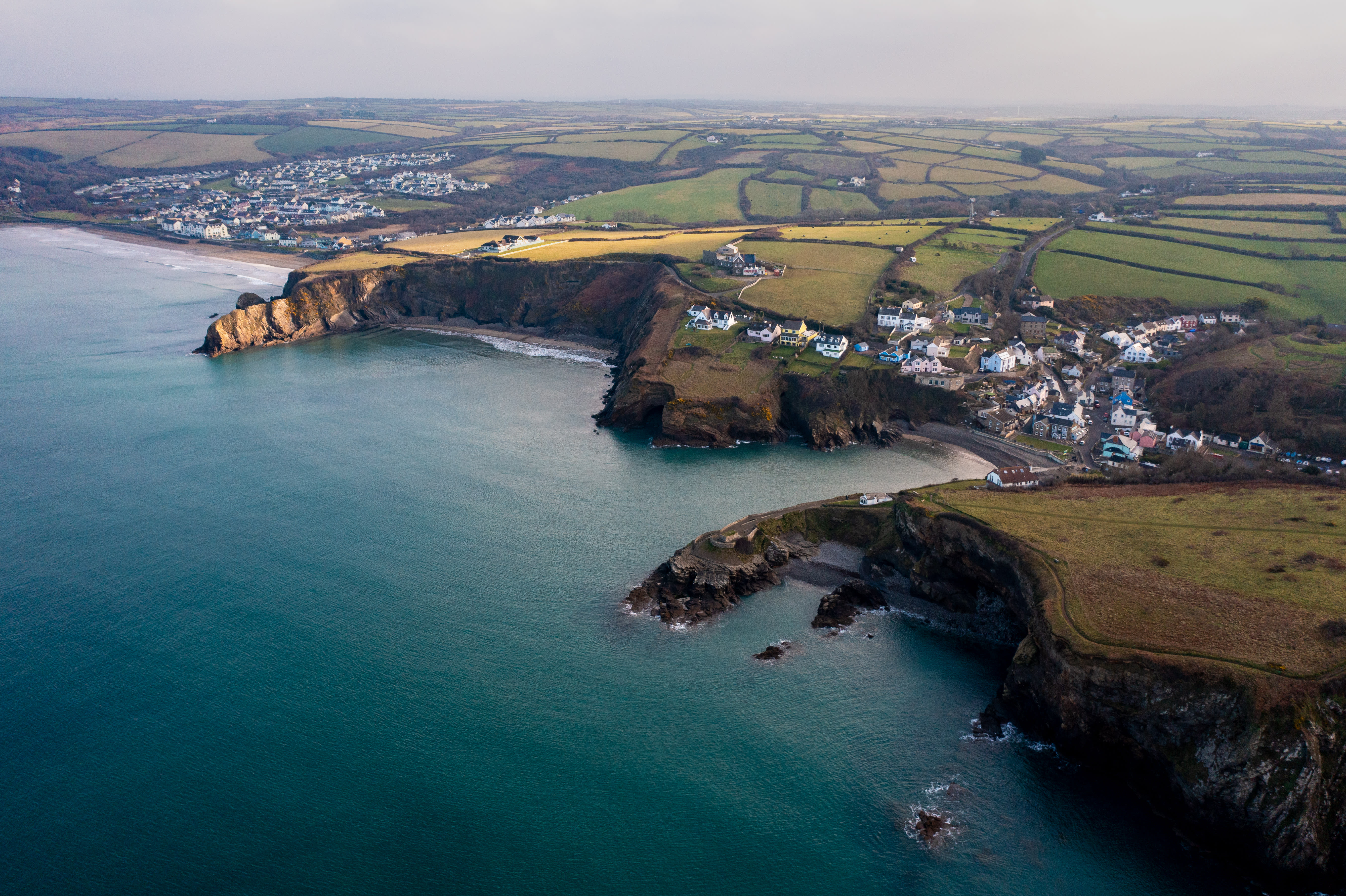 Aerial shot of coast and towns on Pembrokeshire coastline