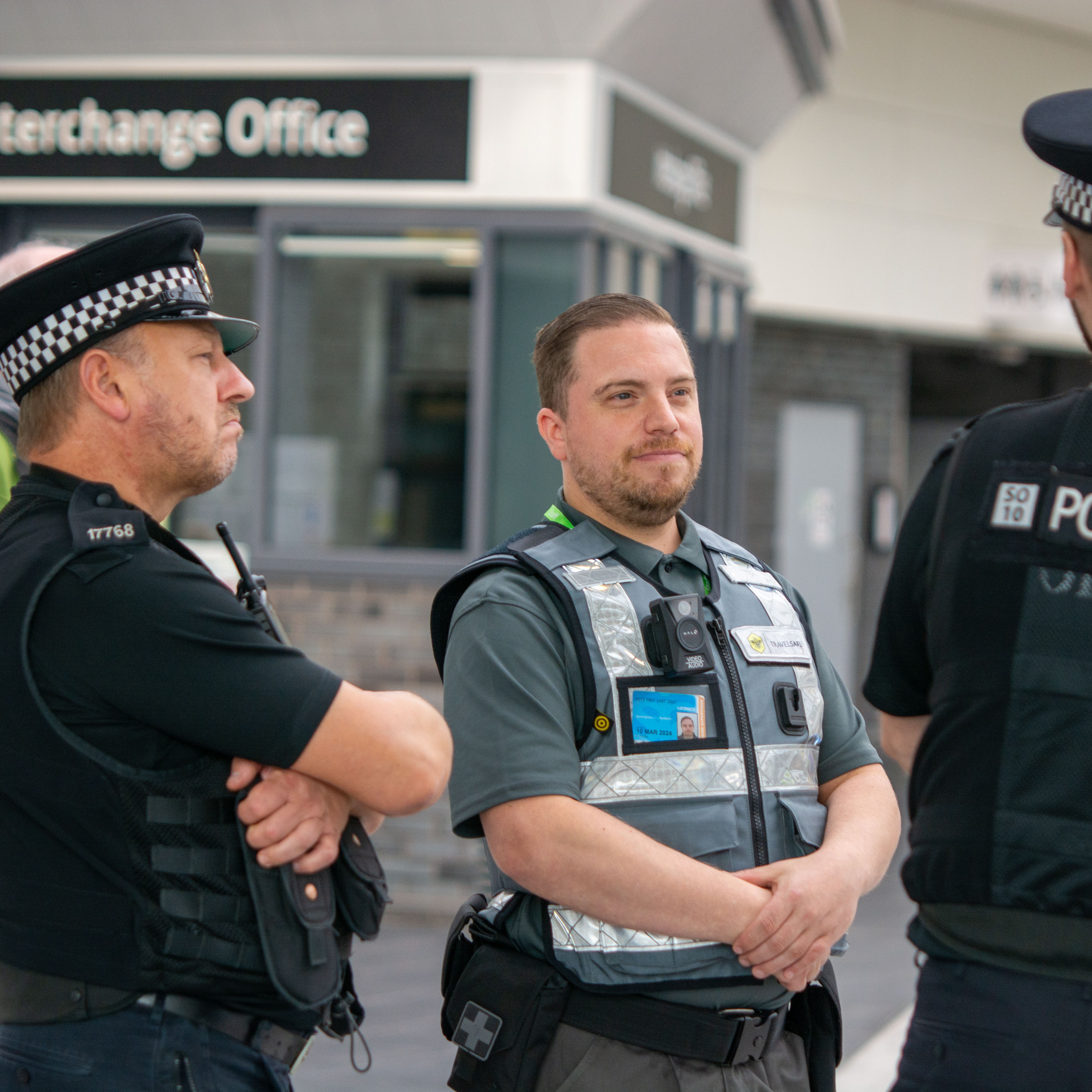 Travelsafe officer with two police officers at Bolton interchange
